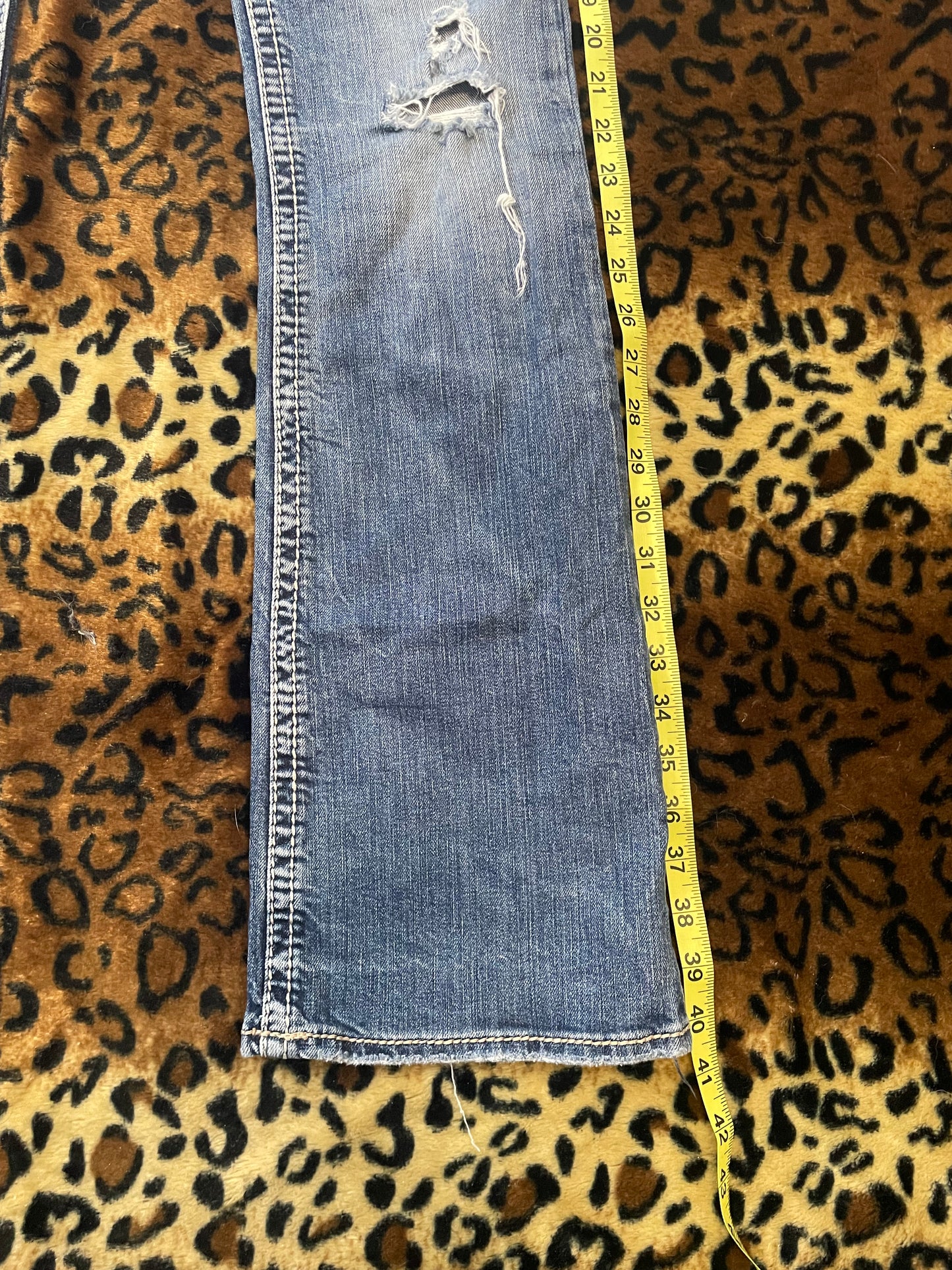 silver lowrise distressed jeans