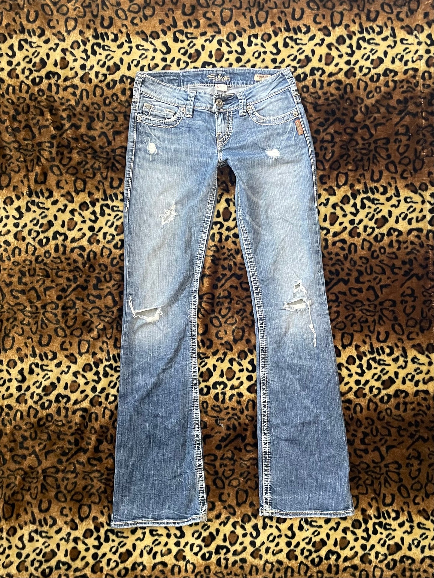 silver lowrise distressed jeans