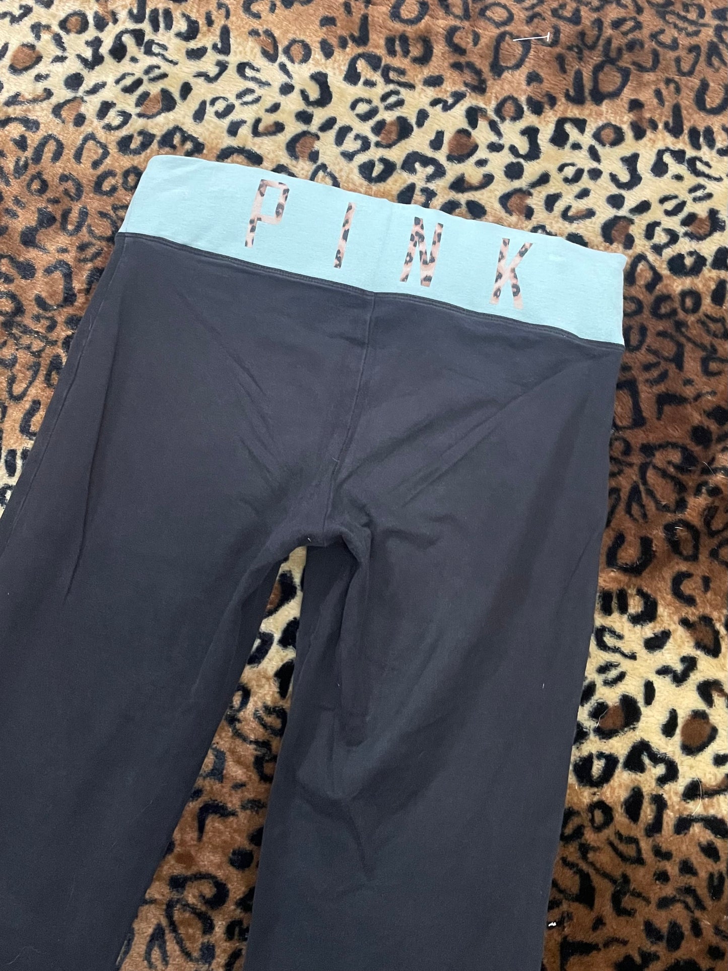 VS Pink reversible cheetah foldover flares