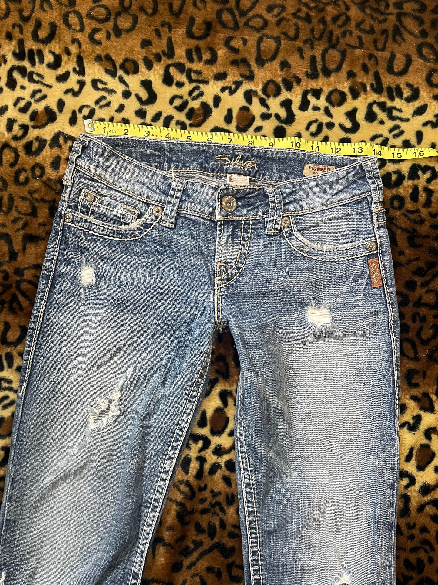 silver lowrise distressed jeans