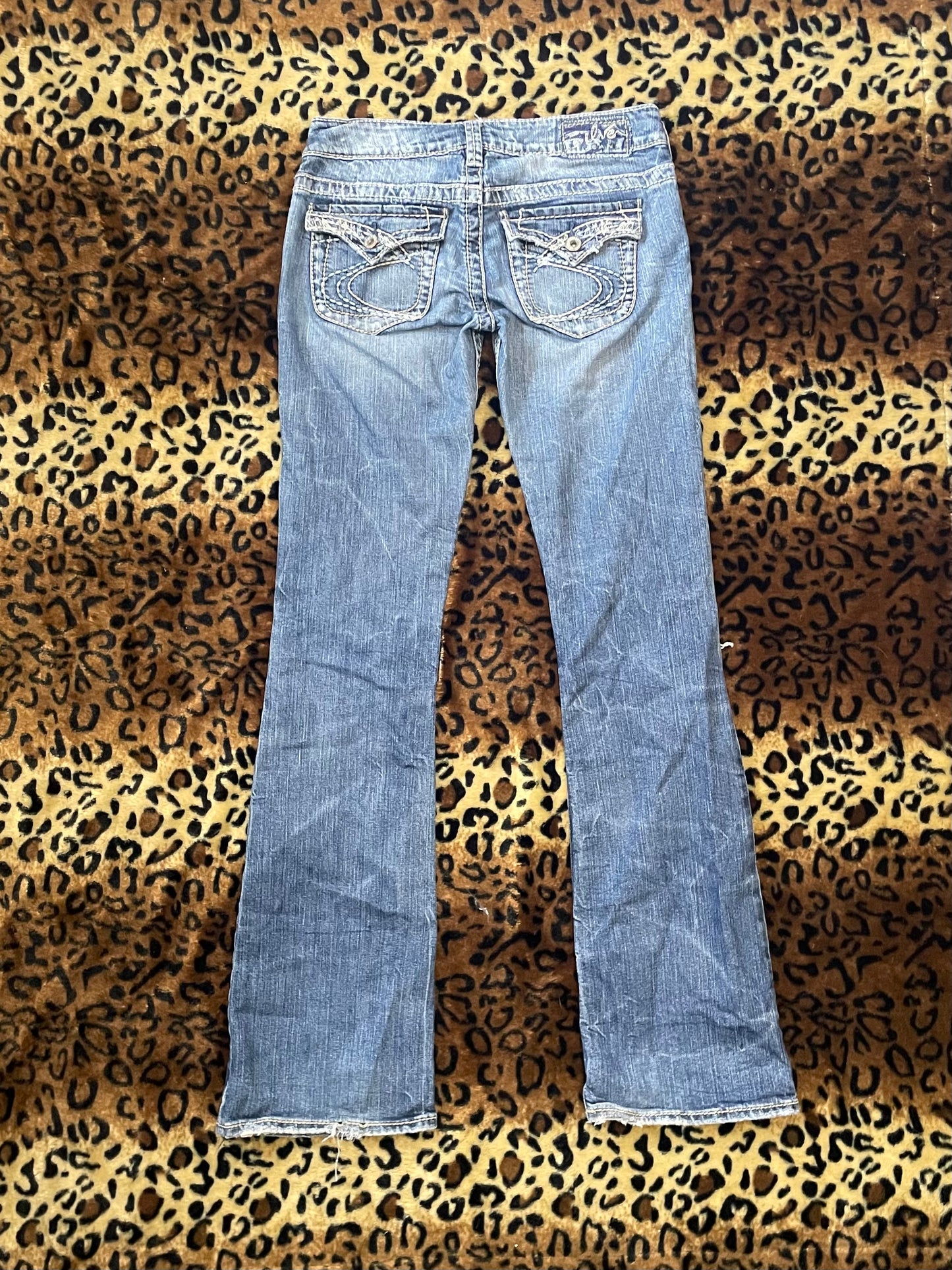 silver lowrise distressed jeans
