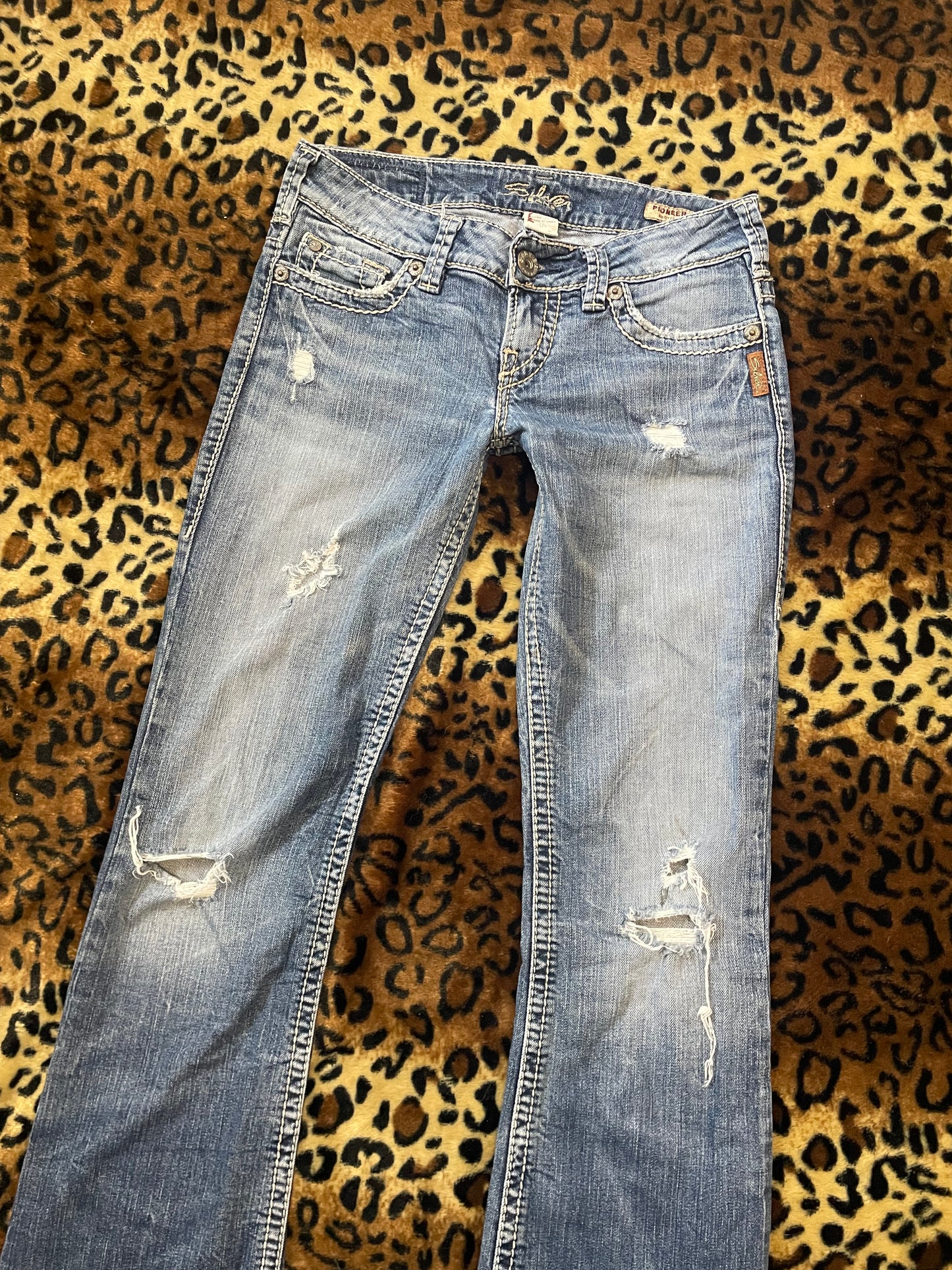 silver lowrise distressed jeans